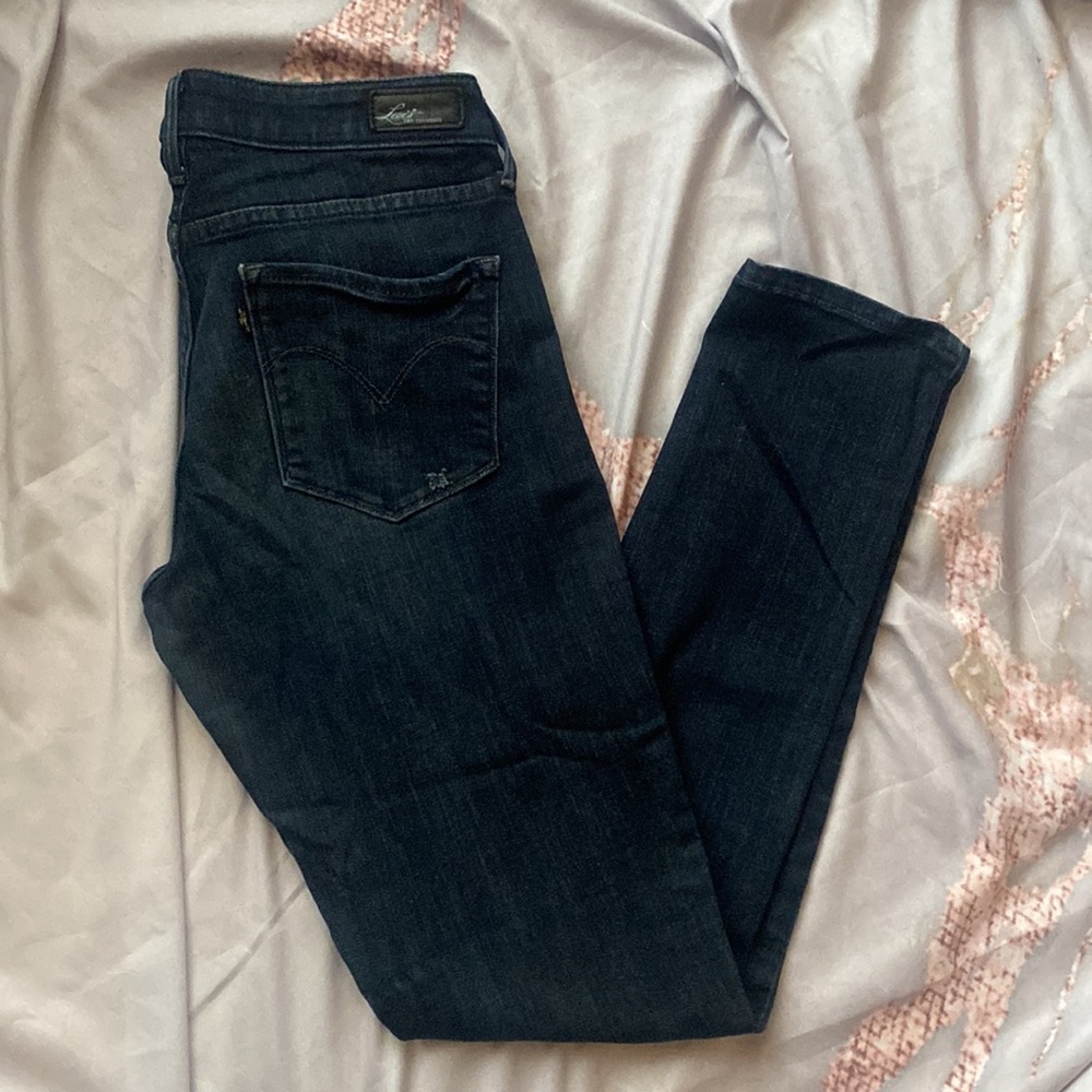 Levi’s Medium Dark Wash Mid Rise Demi Curve Jeans